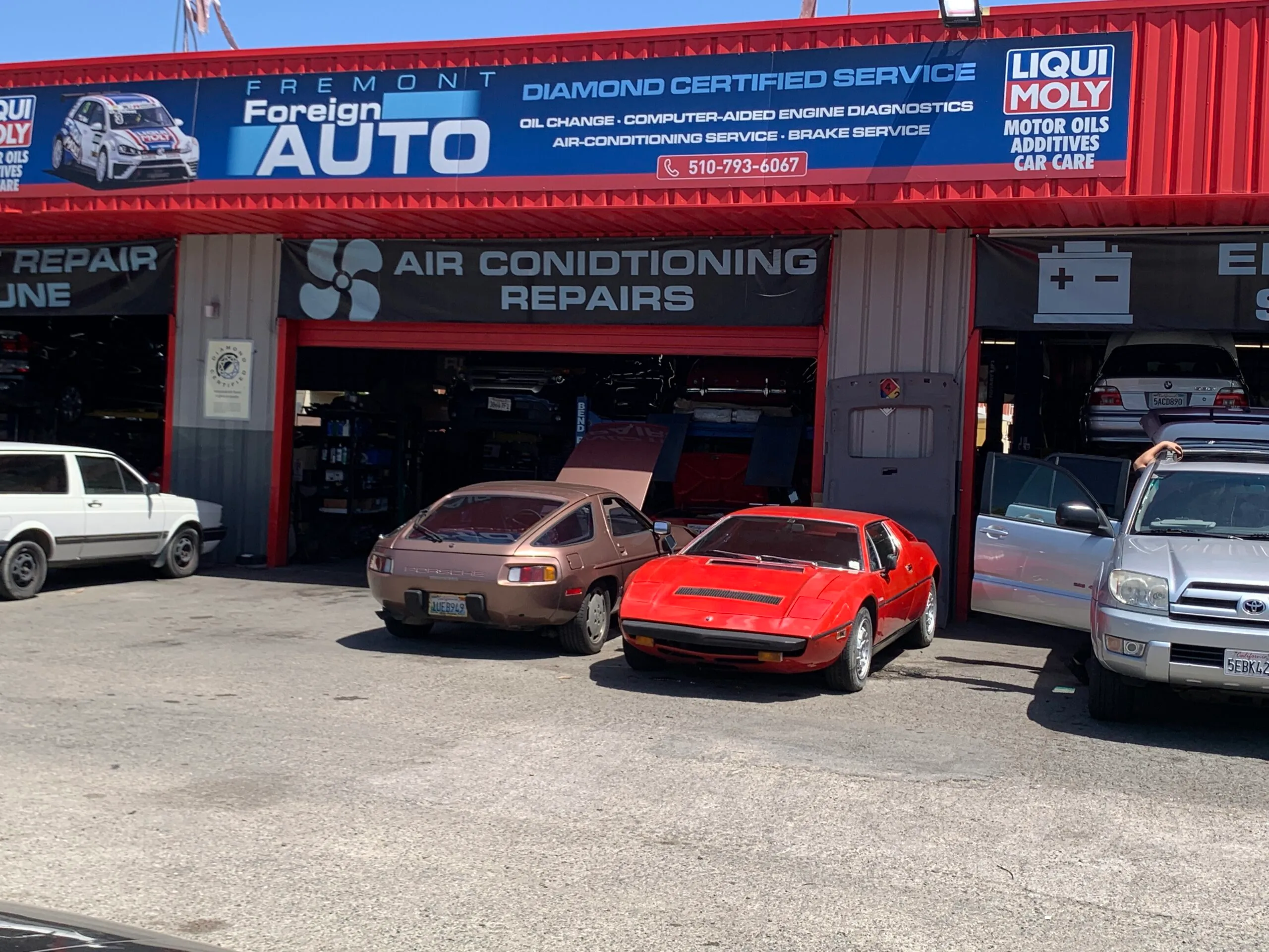 Picture of Outside Fremont Foreign Auto, a vibrant red sports car hints at the quality and expertise within. This shop, recognized for its expertise and quality, invites customers with its open doors. Copyright ©2025 Diamond Certified Resource

 - Fremont Foreign Auto