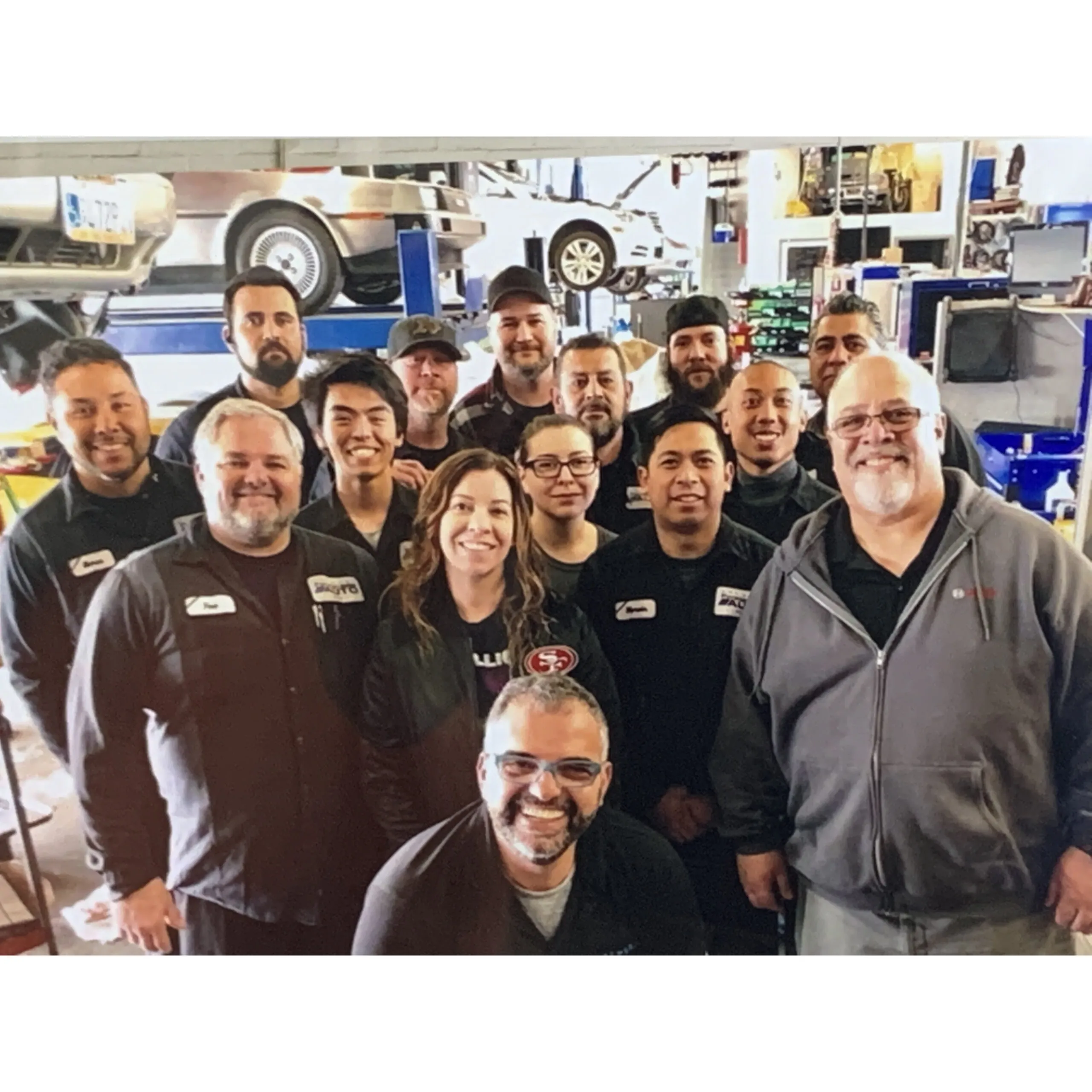 Picture of A close-knit team at Fremont Foreign Auto smiles together in their bustling workshop, where vintage cars are expertly repaired. Recognized for expertise and quality, the company consistently achieves the highest ratings. Copyright ©2025 Diamond Certified Resource

 - Fremont Foreign Auto