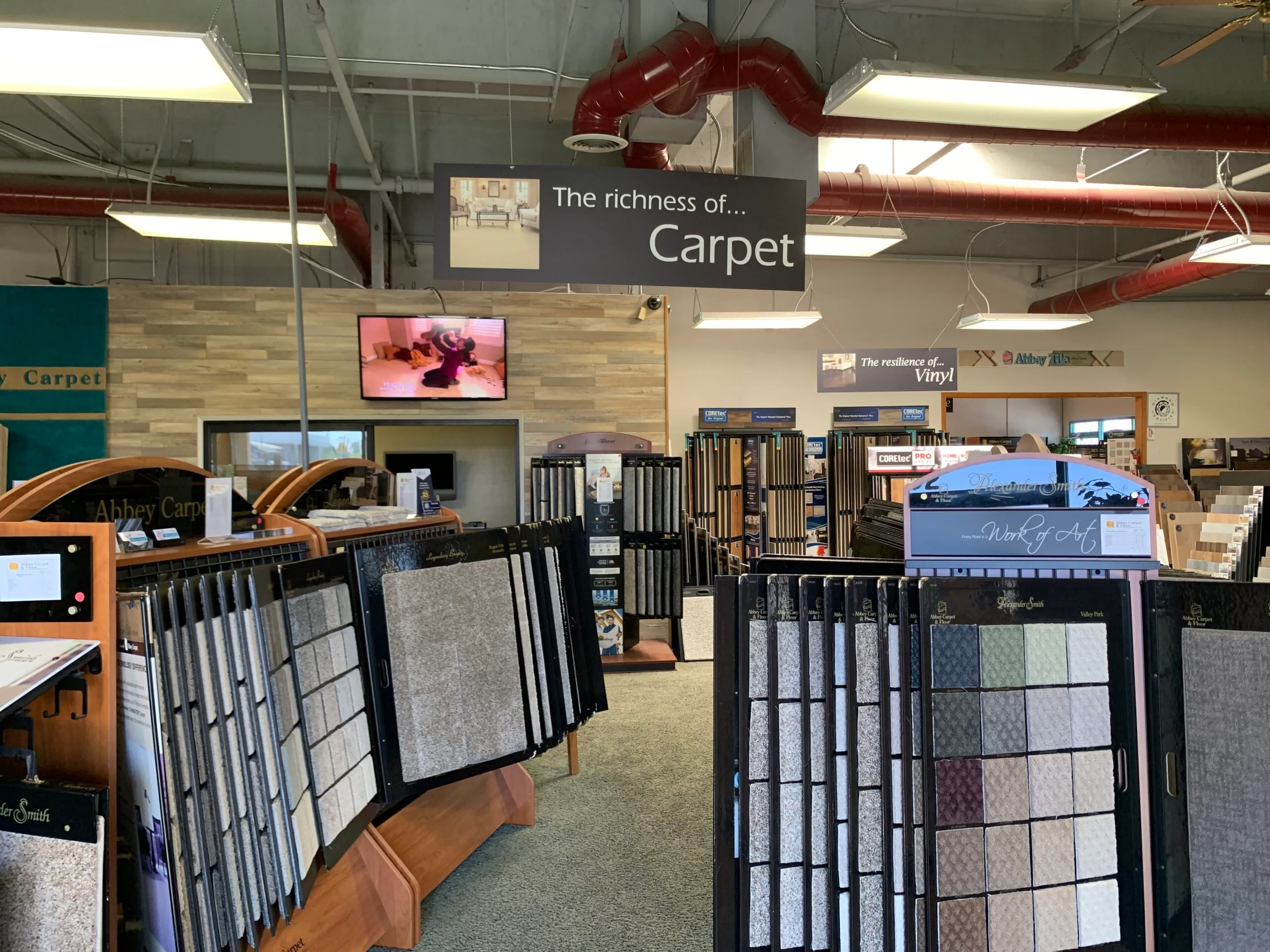 Picture of In the inviting showroom of Abbey Carpets by Fashion Floors, an array of carpet samples stands ready to inspire. This dedication to quality options reflects the companyâ€™s high customer satisfaction ratings. Copyright ©2025 Diamond Certified Resource

 - Abbey Carpets by Fashion Floors
