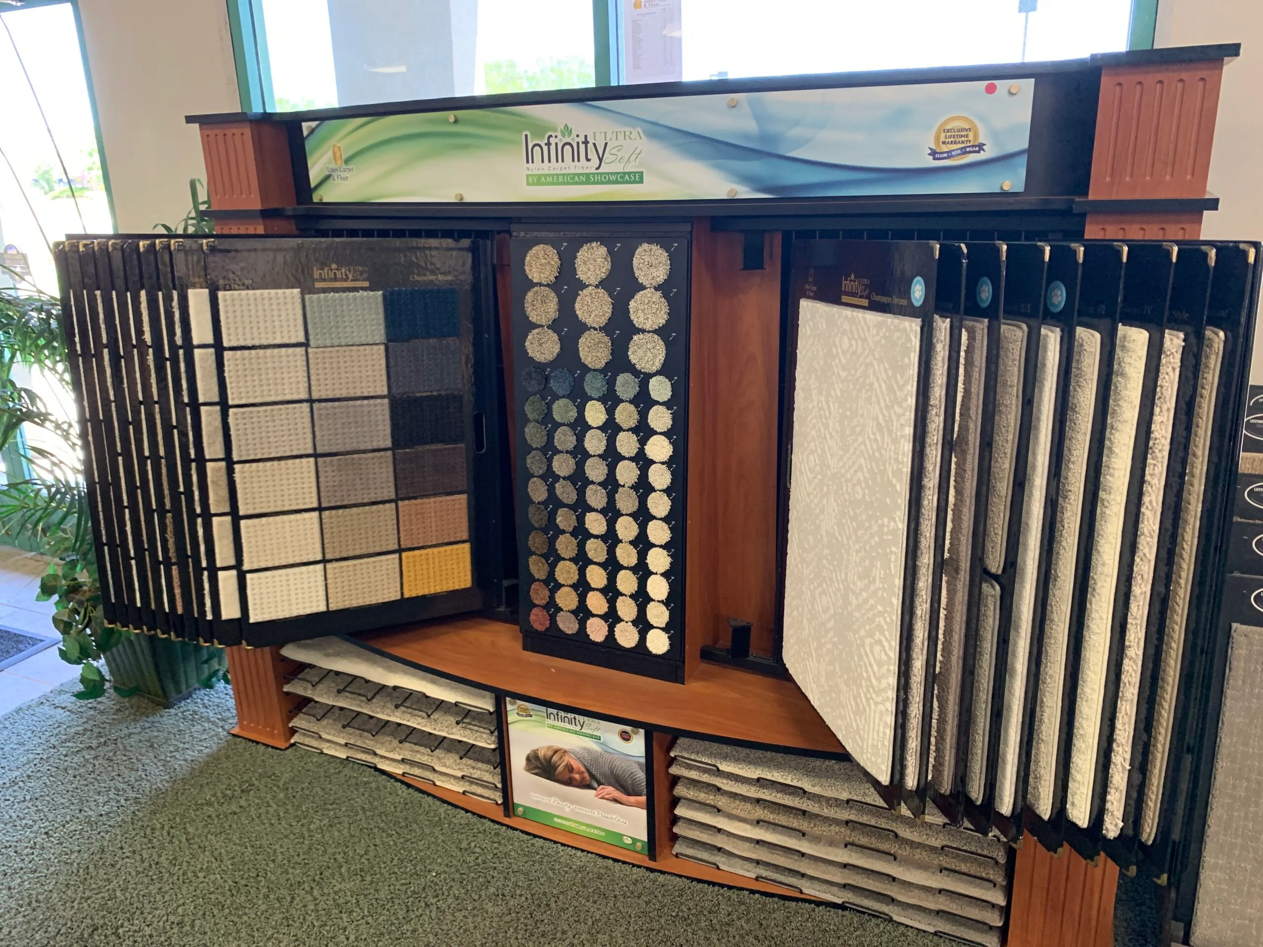 Picture of A variety of carpet samples are meticulously displayed at Abbey Carpets by Fashion Floors, offering a tactile journey into texture and design. The company is recognized for expertise and quality, ensuring top-rated selections for every customer. Copyright ©2025 Diamond Certified Resource - Abbey Carpets by Fashion Floors