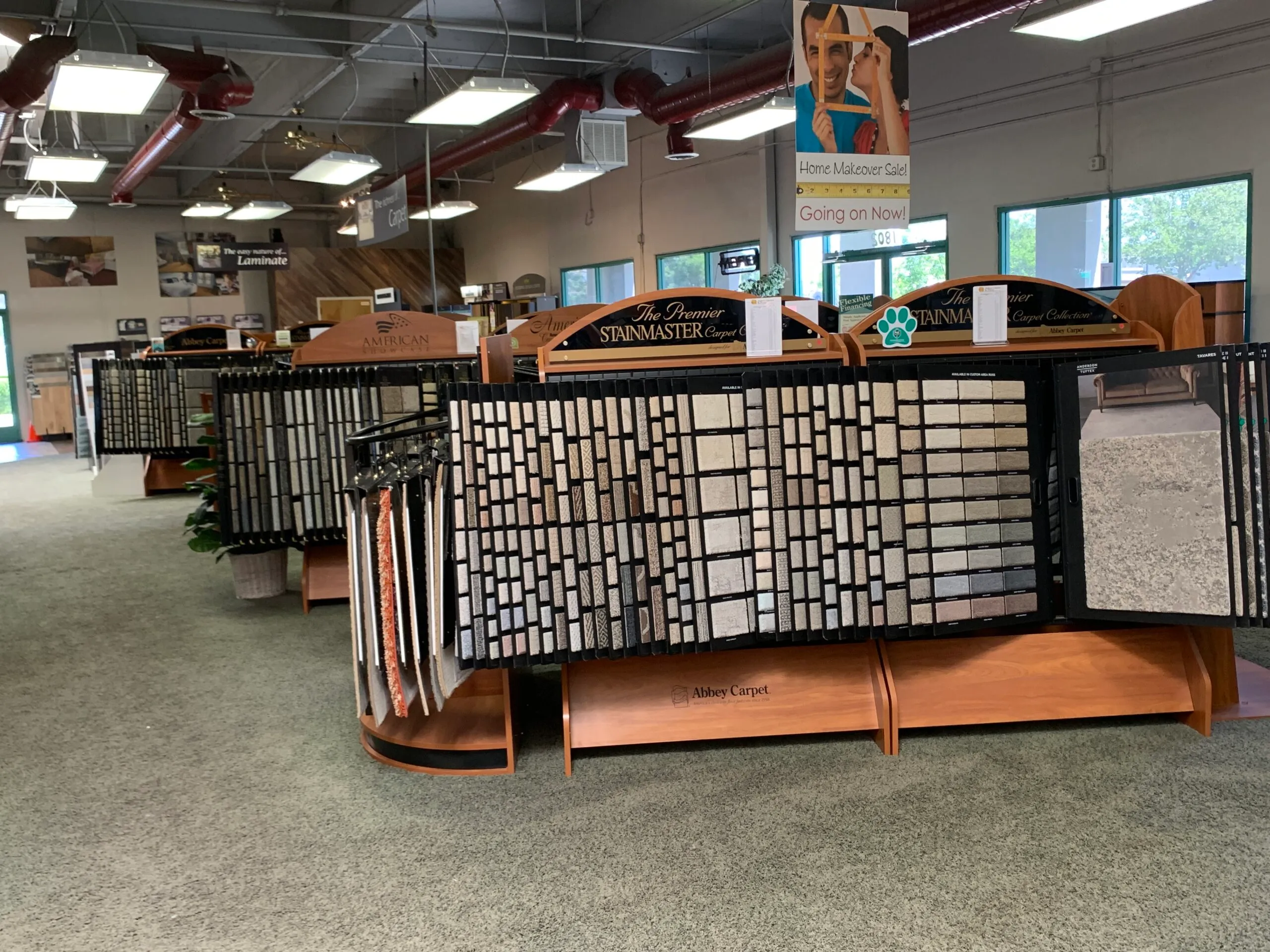 Picture of Displayed in neat rows, an array of carpet samples invites customers at Abbey Carpets by Fashion Floors to explore quality options tailored to their needs. Recognized for expertise and quality, this showroom reflects the companyâ€™s commitment to high standards. Copyright ©2025 Diamond Certified Resource

 - Abbey Carpets by Fashion Floors