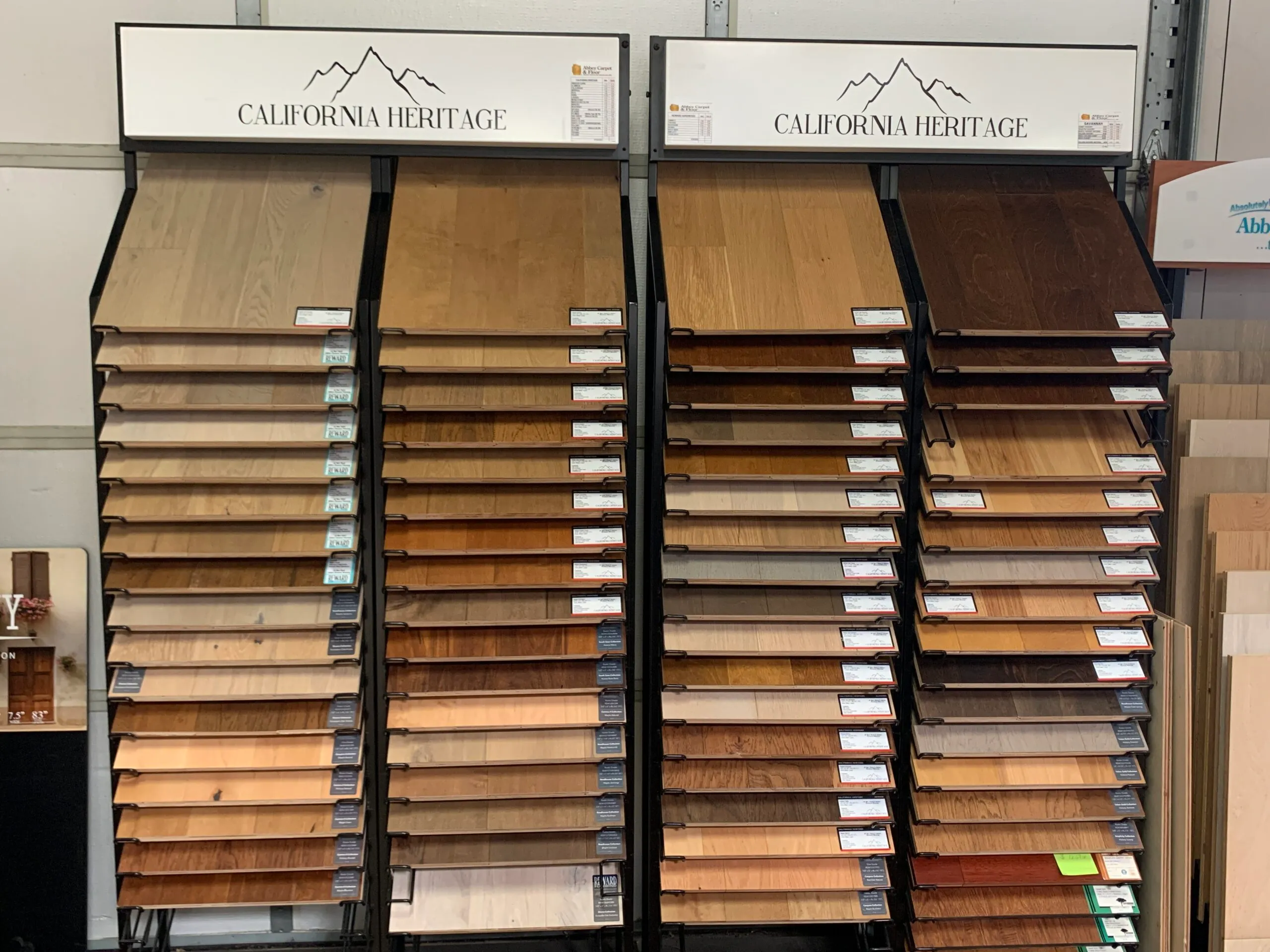 Picture of At Abbey Carpets by Fashion Floors, a range of California Heritage wood samples showcases the companyâ€™s dedication to quality outcomes. The carefully organized display hints at the expert guidance offered to clients in selecting the perfect flooring. Copyright ©2025 Diamond Certified Resource - Abbey Carpets by Fashion Floors