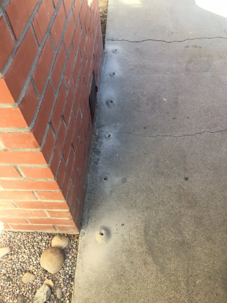 Picture of Subtle drill marks in the concrete, evidence of Great Wall Termite Control's meticulous work, highlight their commitment to effective pest management. The company's expertise ensures long-lasting protection for homes, consistently achieving a Highest in Quality rating. Copyright ©2025 Diamond Certified Resource

 - Great Wall Termite Control