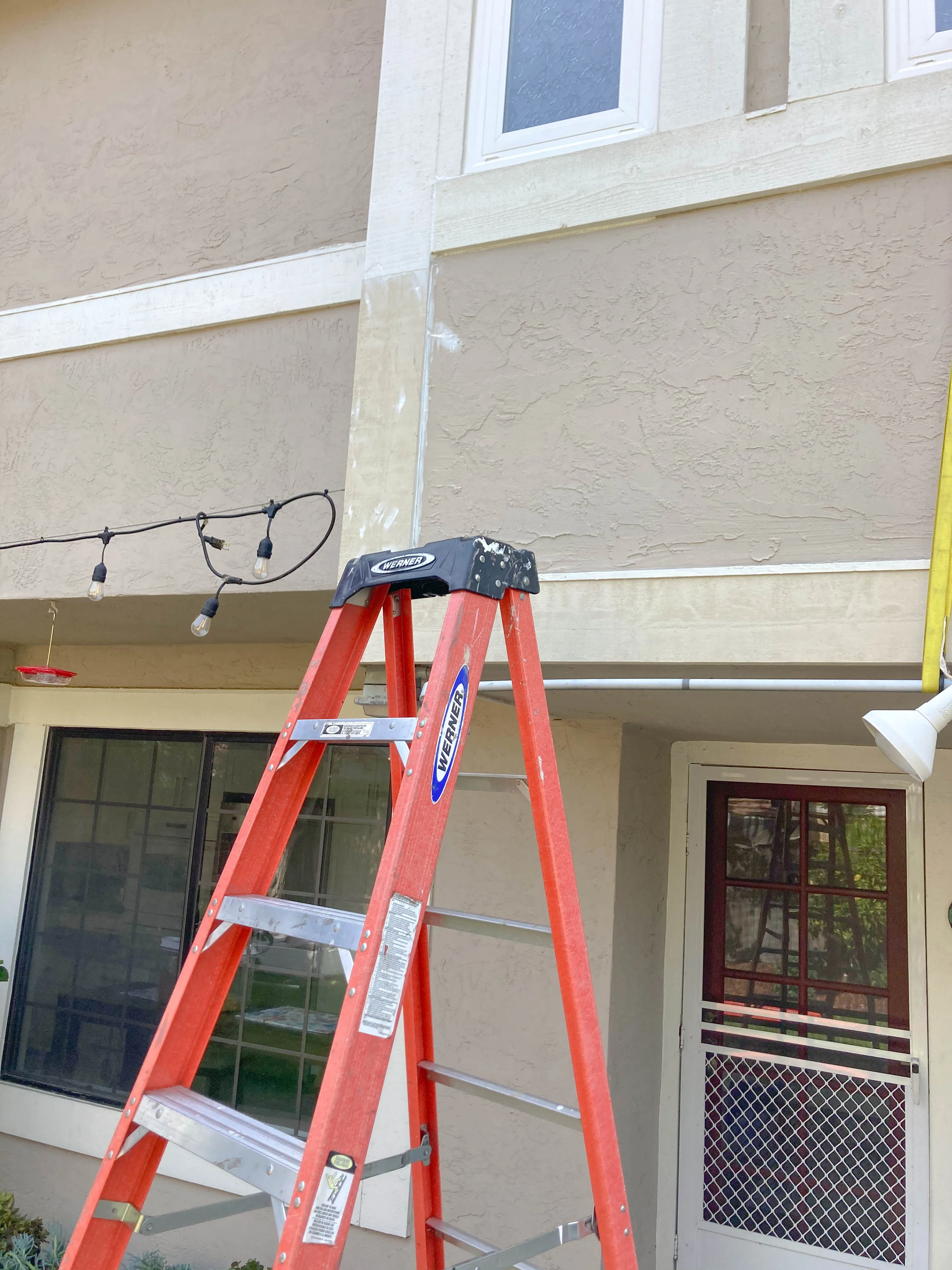 Picture of A bright orange ladder leans against a residential property, hinting at ongoing maintenance. Great Wall Termite Control ensures high customer satisfaction ratings by addressing structural needs with precision. Copyright ©2025 Diamond Certified Resource

 - Great Wall Termite Control