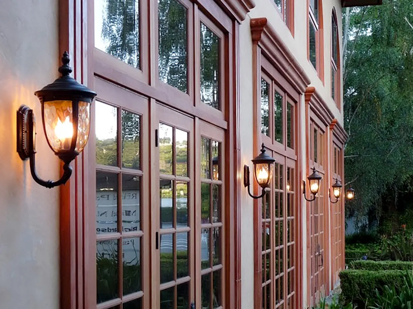 Picture of Elegant lanterns cast a warm glow on the meticulously crafted windows of a serene building faÃ§ade, showcasing Electro-Integrity's focus on quality outcomes. Copyright ©2025 Diamond Certified Resource

 - Electro-Integrity