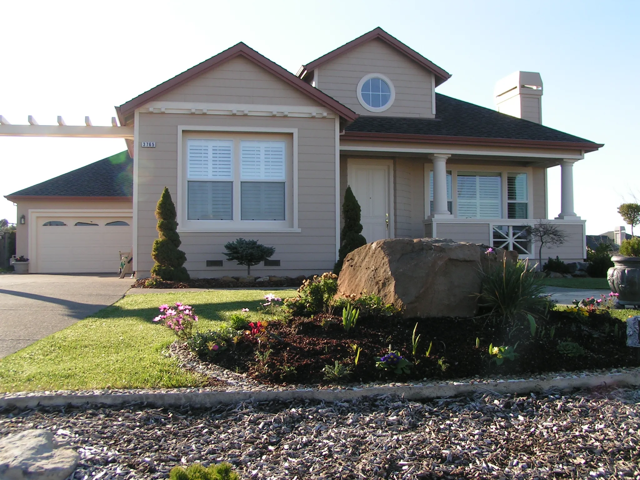 Picture of The charming facade of a well-maintained home is enhanced by a vibrant garden, showcasing Solidarity Painting, Inc.'s commitment to quality outcomes. Their work consistently achieved a Highest in Quality rating. Copyright ©2025 Diamond Certified Resource

 - Solidarity Painting, Inc.
