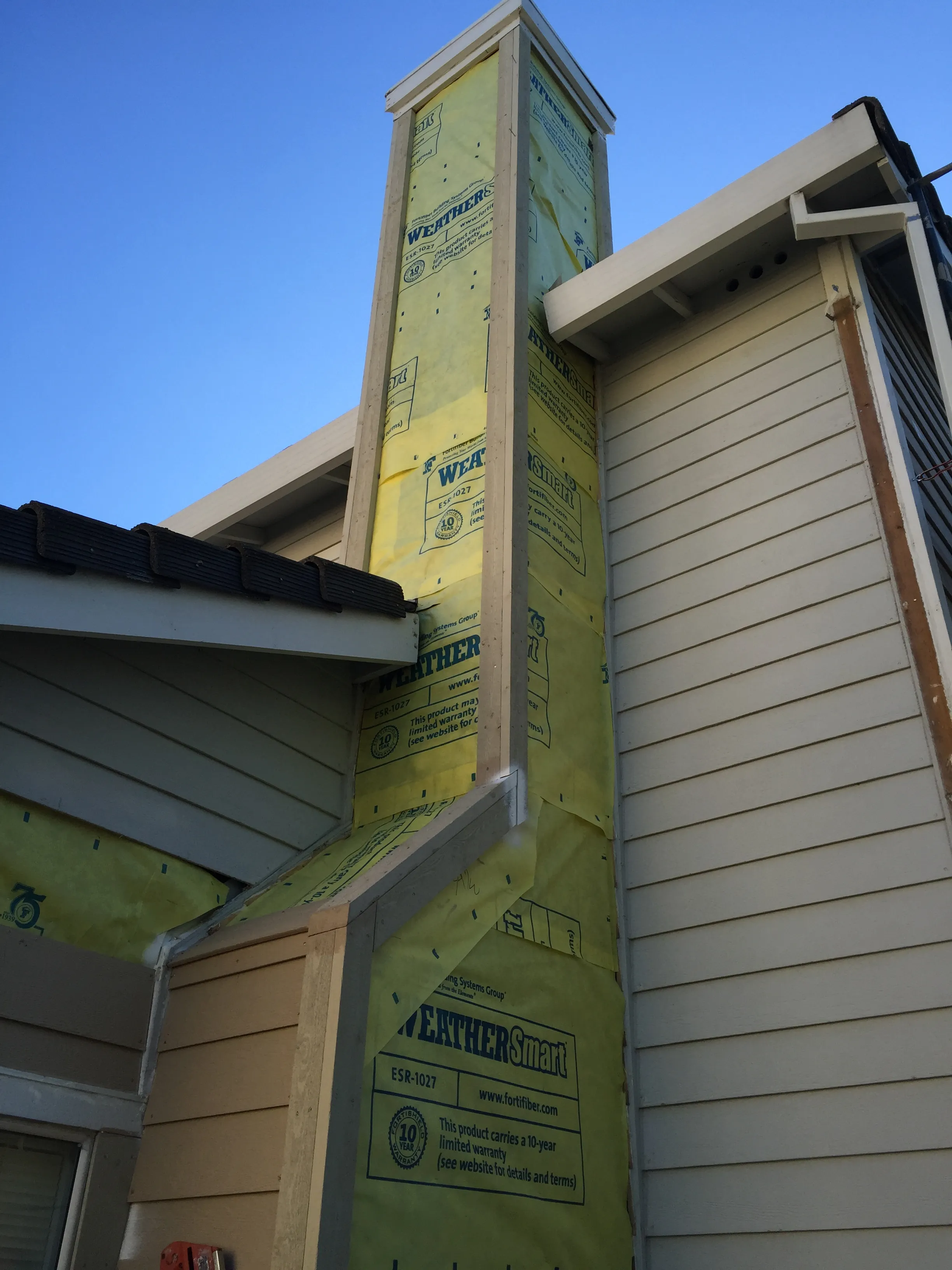 Picture of A siding project in progress reveals the precision and care Solidarity Painting, Inc. brings to every task. Known for their high customer satisfaction ratings, they transform exteriors with finesse. Copyright ©2025 Diamond Certified Resource - Solidarity Painting, Inc.